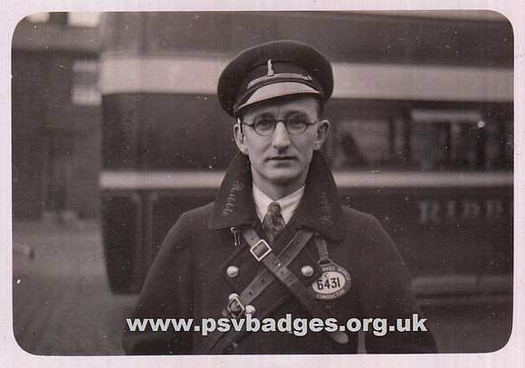 C 6431 early enameled hanging badge. Ribble Conductor note  non standard cap badge.