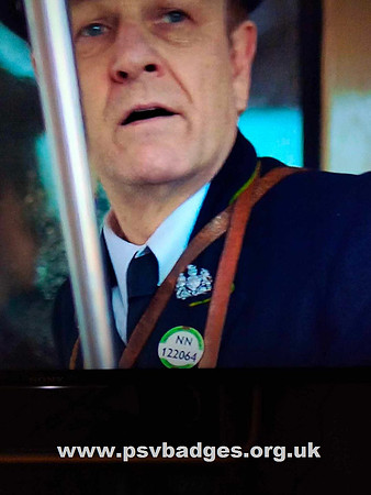 NN 122064 Sean Bean as a Bus Conductor in World on Fire. Unauthentic badge for the period.