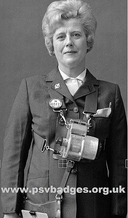 N 103127 Large 6 figure font. Evelyn Hofer, LT Bus conductress 1977