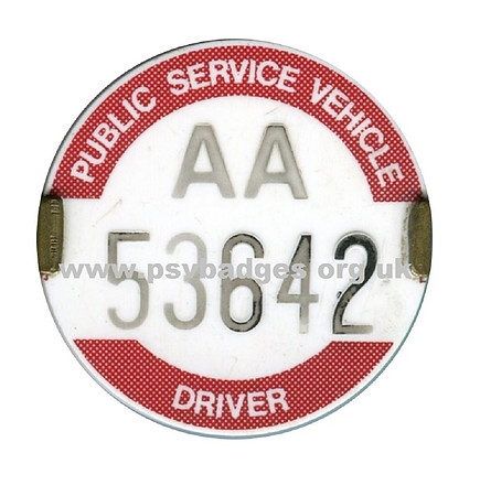 AA 53642 early plastic embossed badge. These faded very badly.